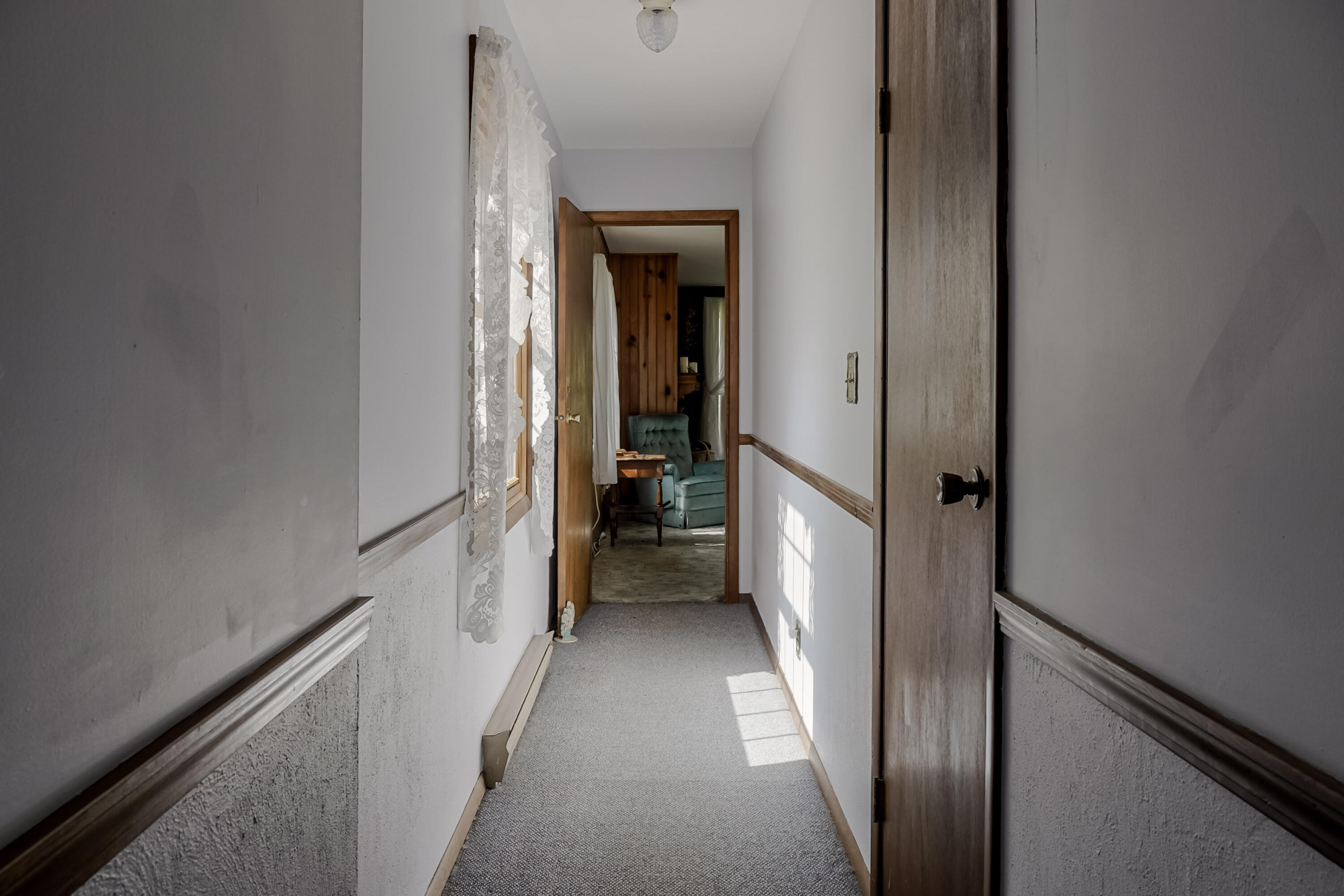 9014 East 129th Avenue Crown Point, IN 46307 - Photo 18 of 56 a view of a hallway with a white walls