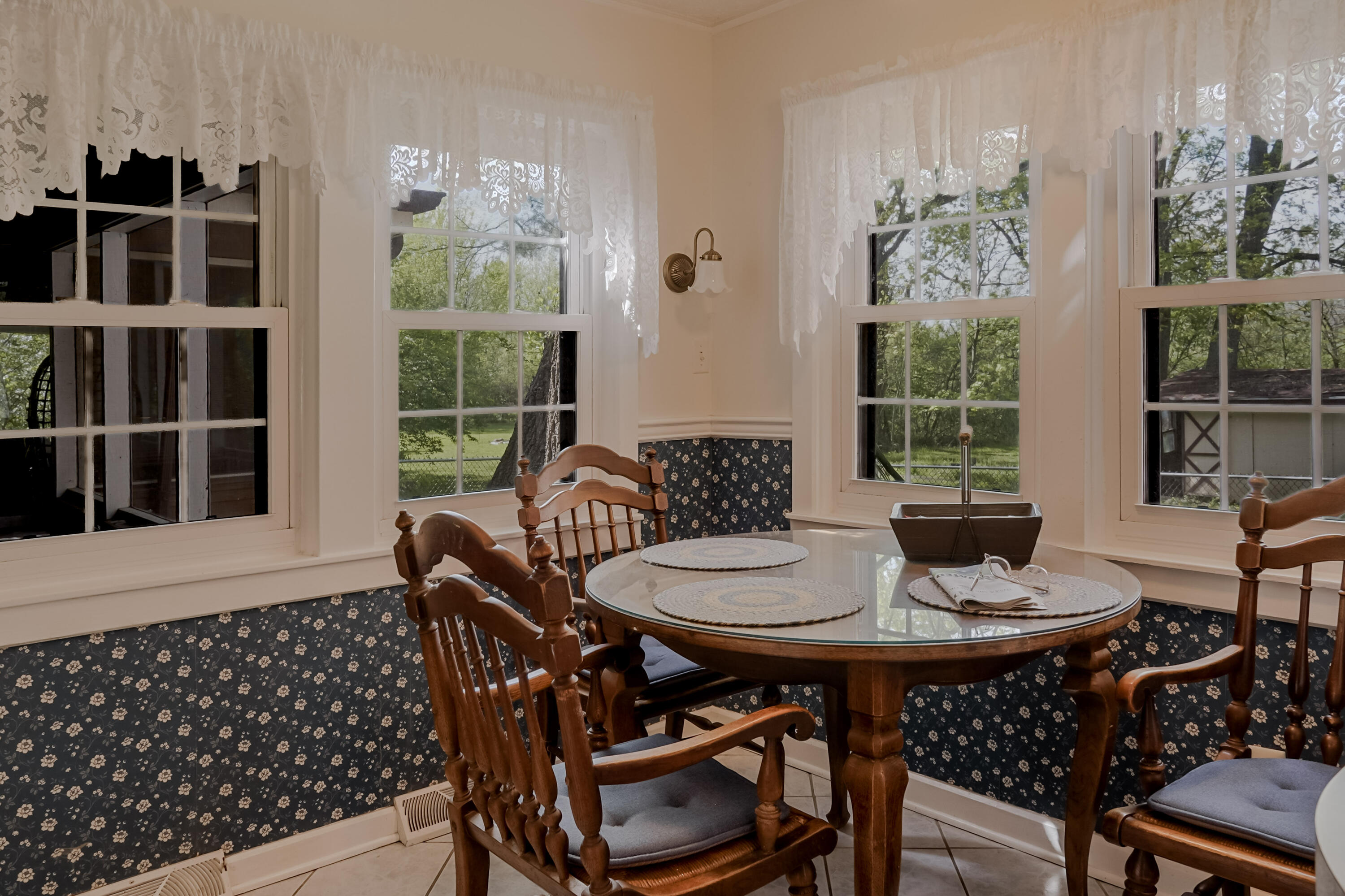 9014 East 129th Avenue Crown Point, IN 46307 - Photo 26 of 56 a view of a dining room with furniture window and outside view