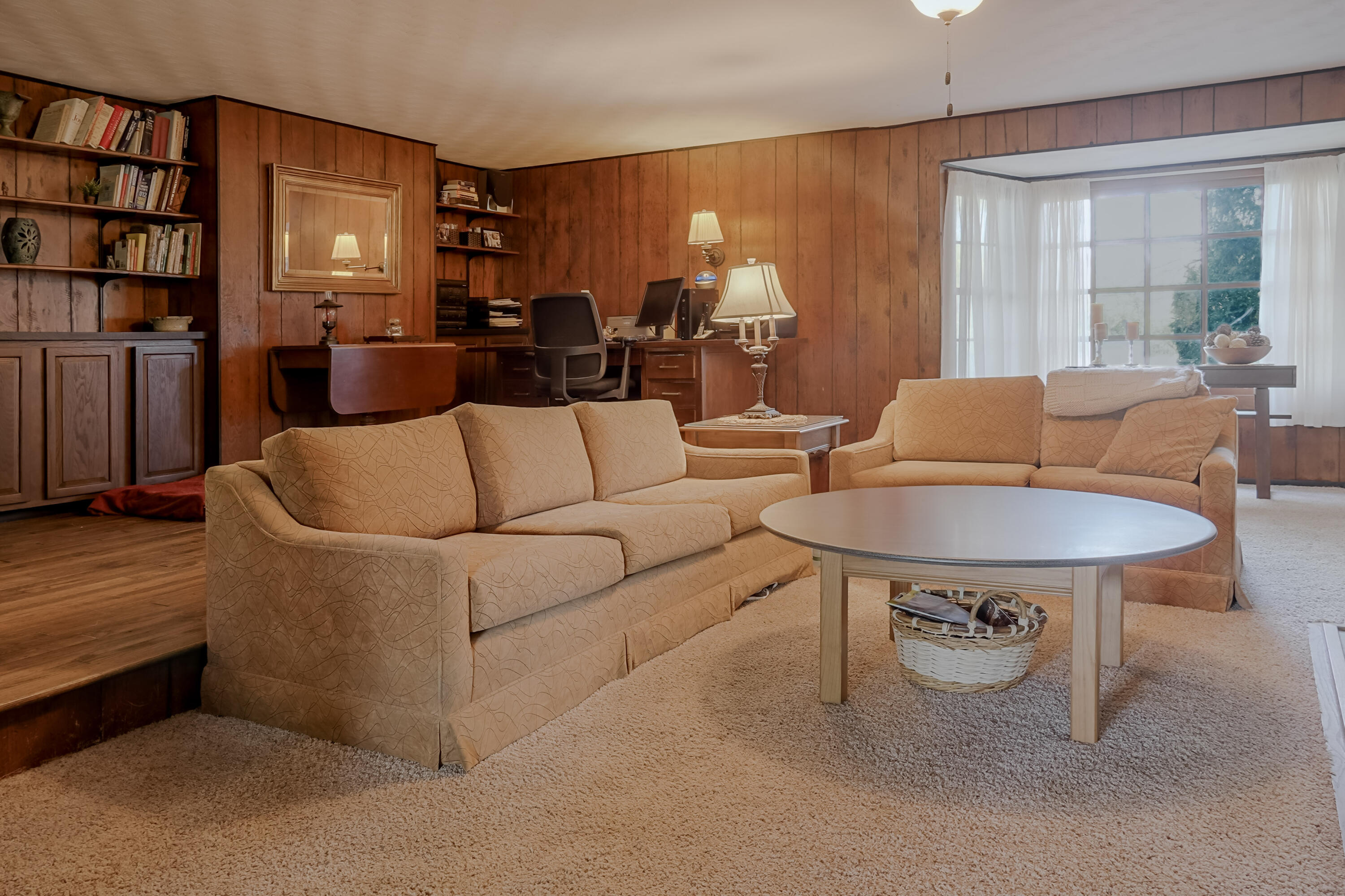 9014 East 129th Avenue Crown Point, IN 46307 - Photo 27 of 56 a living room with furniture and a window