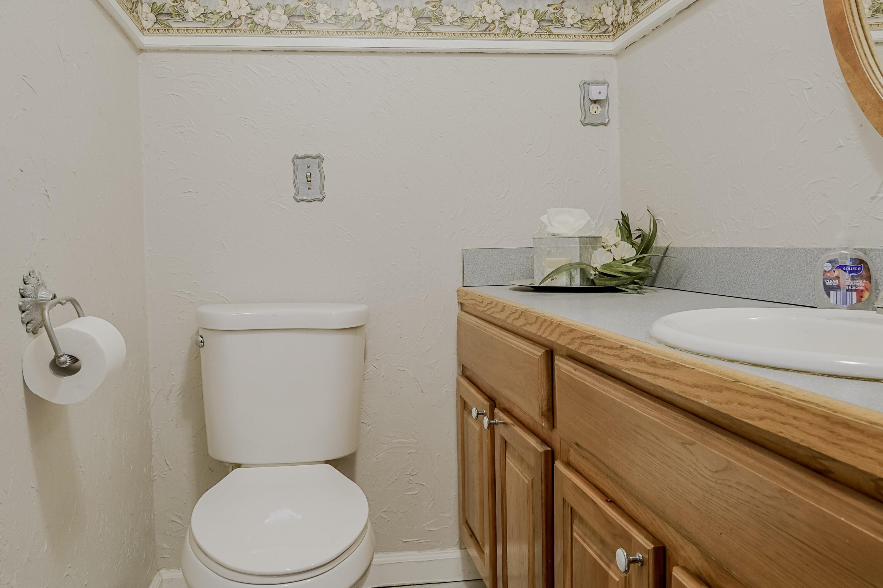 9014 East 129th Avenue Crown Point, IN 46307 - Photo 33 of 56 a bathroom with a toilet sink and mirror