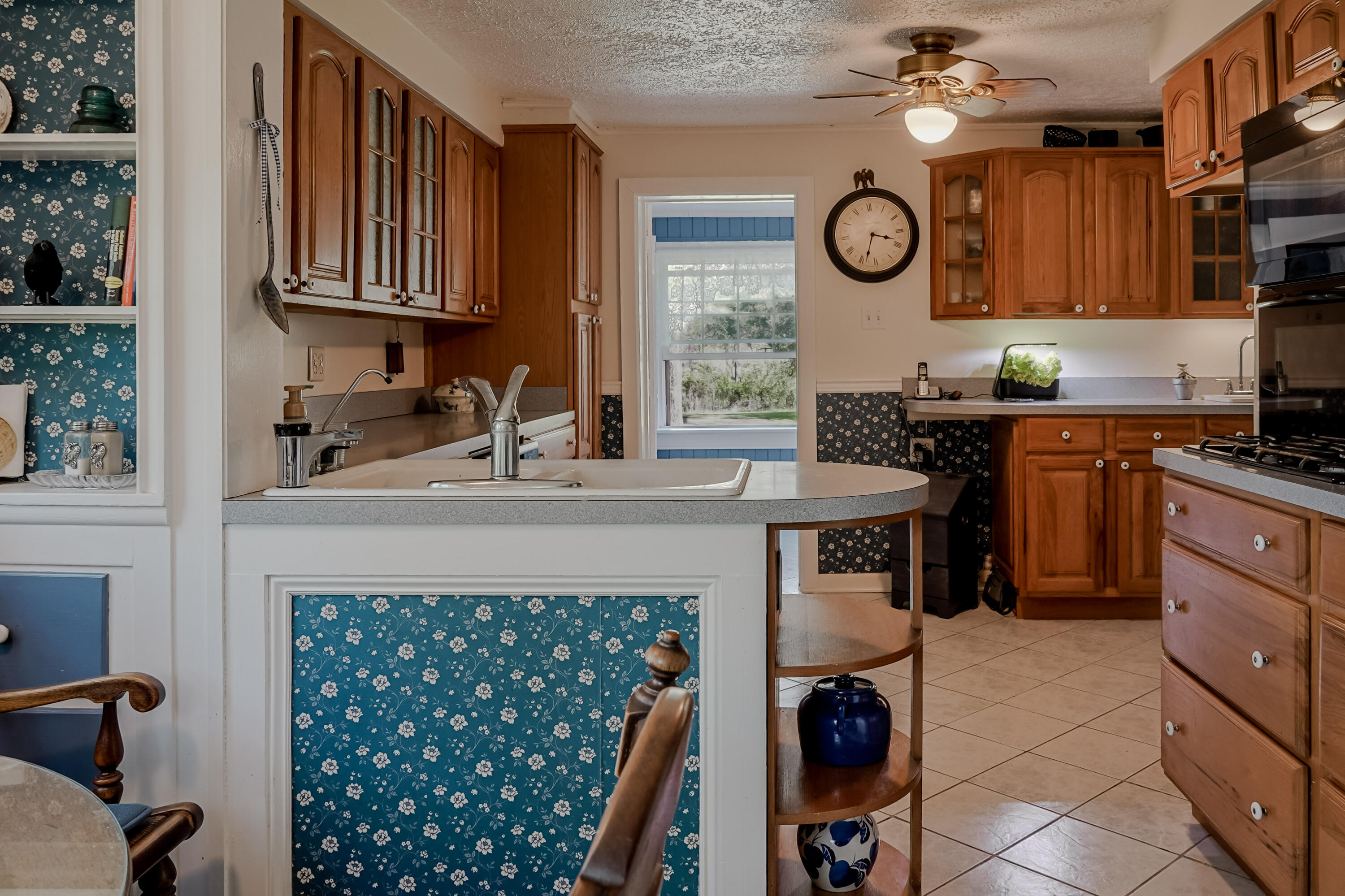 9014 East 129th Avenue Crown Point, IN 46307 - Photo 34 of 56 a kitchen with stainless steel appliances a stove a sink and a refrigerator