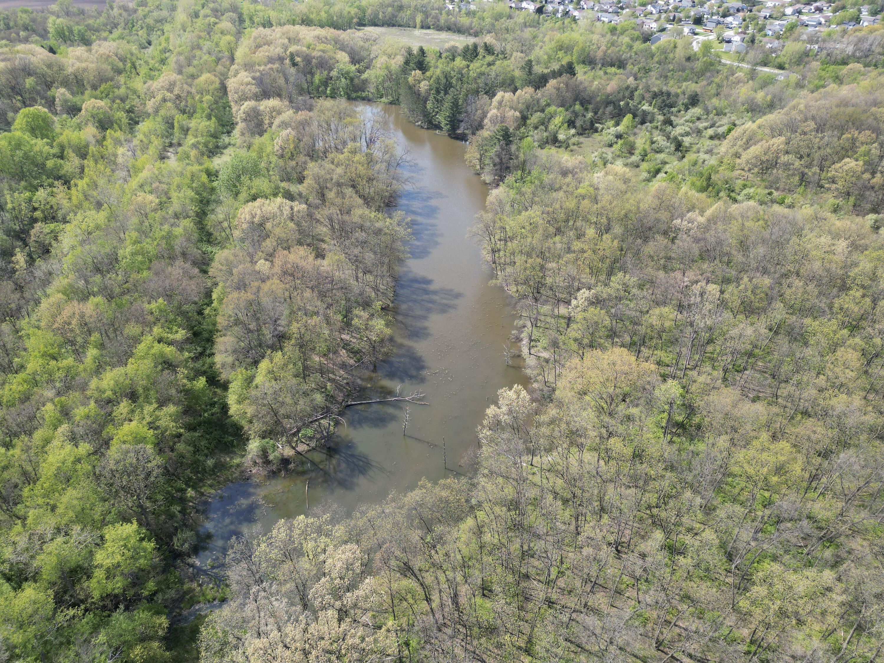 9014 East 129th Avenue Crown Point, IN 46307 - Photo 4 of 56 a view of a lake with a mountain view