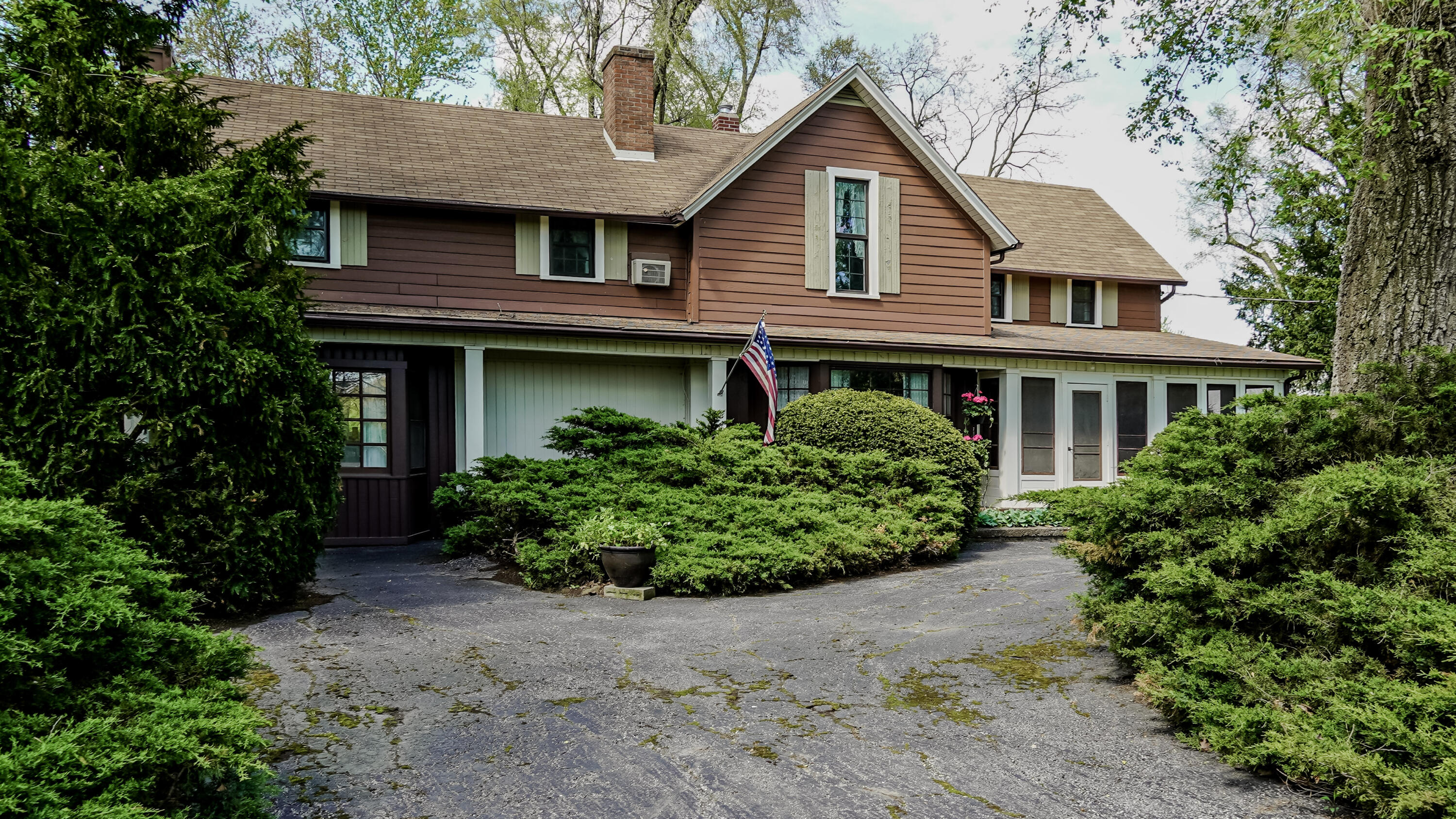 9014 East 129th Avenue Crown Point, IN 46307 - Photo 43 of 56 a front view of a house with garden