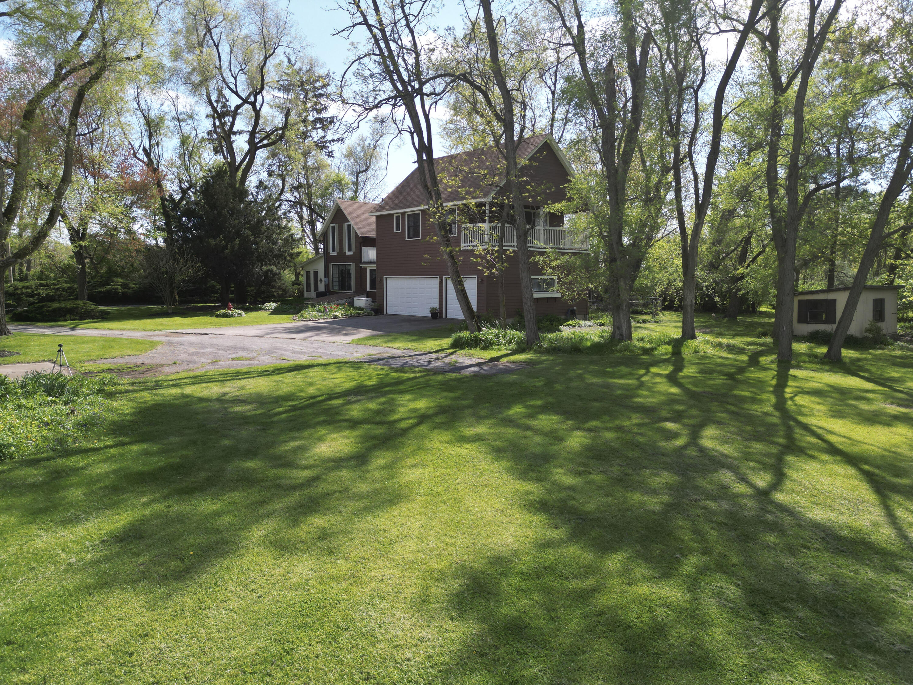 9014 East 129th Avenue Crown Point, IN 46307 - Photo 45 of 56 a view of a house with a yard