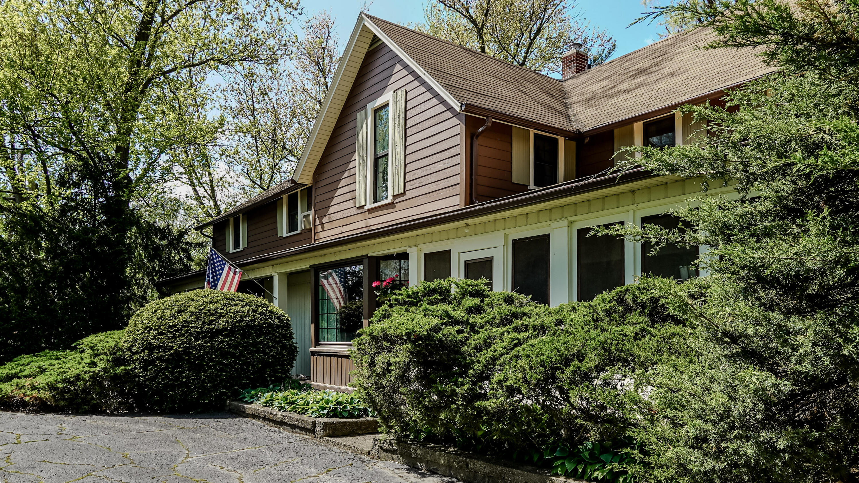 9014 East 129th Avenue Crown Point, IN 46307 - Photo 6 of 56 a front view of a house with a yard
