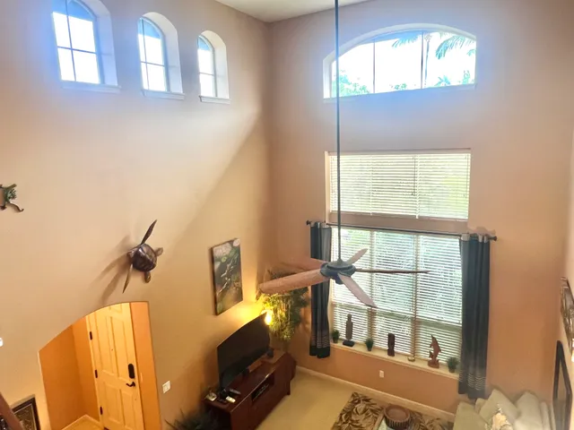 a view of a living room with a window