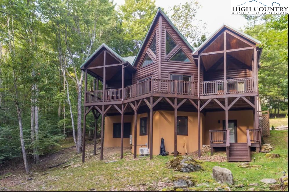 124 Aster Trail Beech Mountain, NC 28604 - Photo 24 of 26 a view of a house with a yard