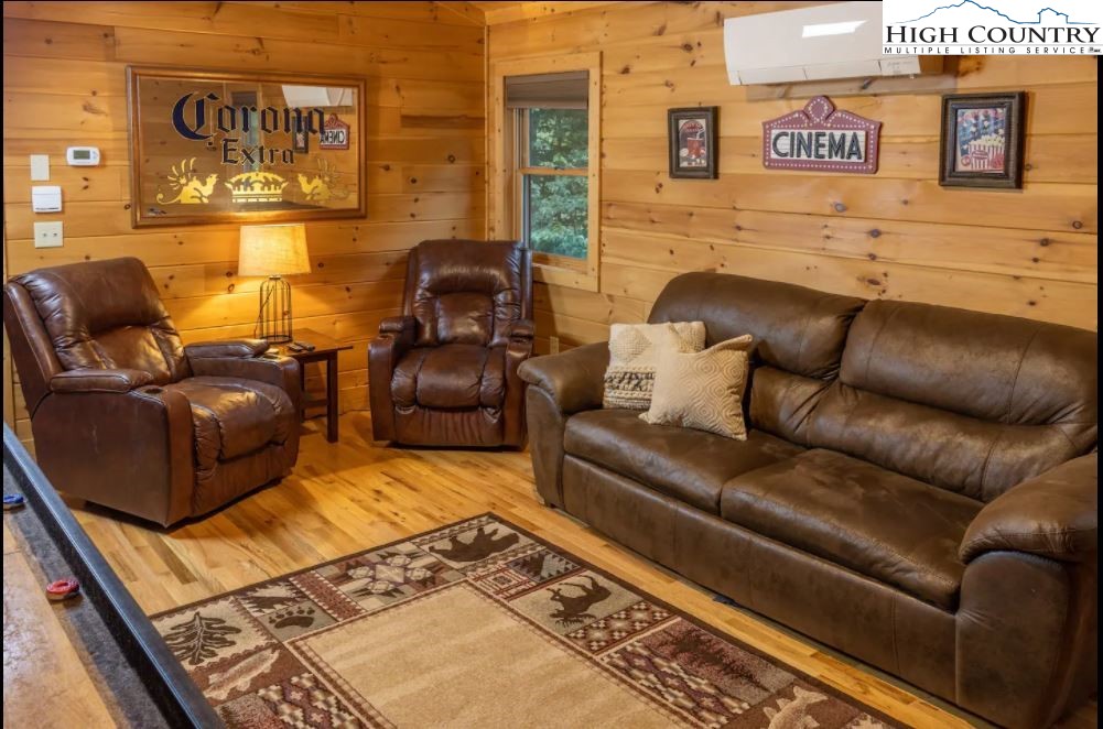 124 Aster Trail Beech Mountain, NC 28604 - Photo 10 of 26 a living room with furniture and a rug