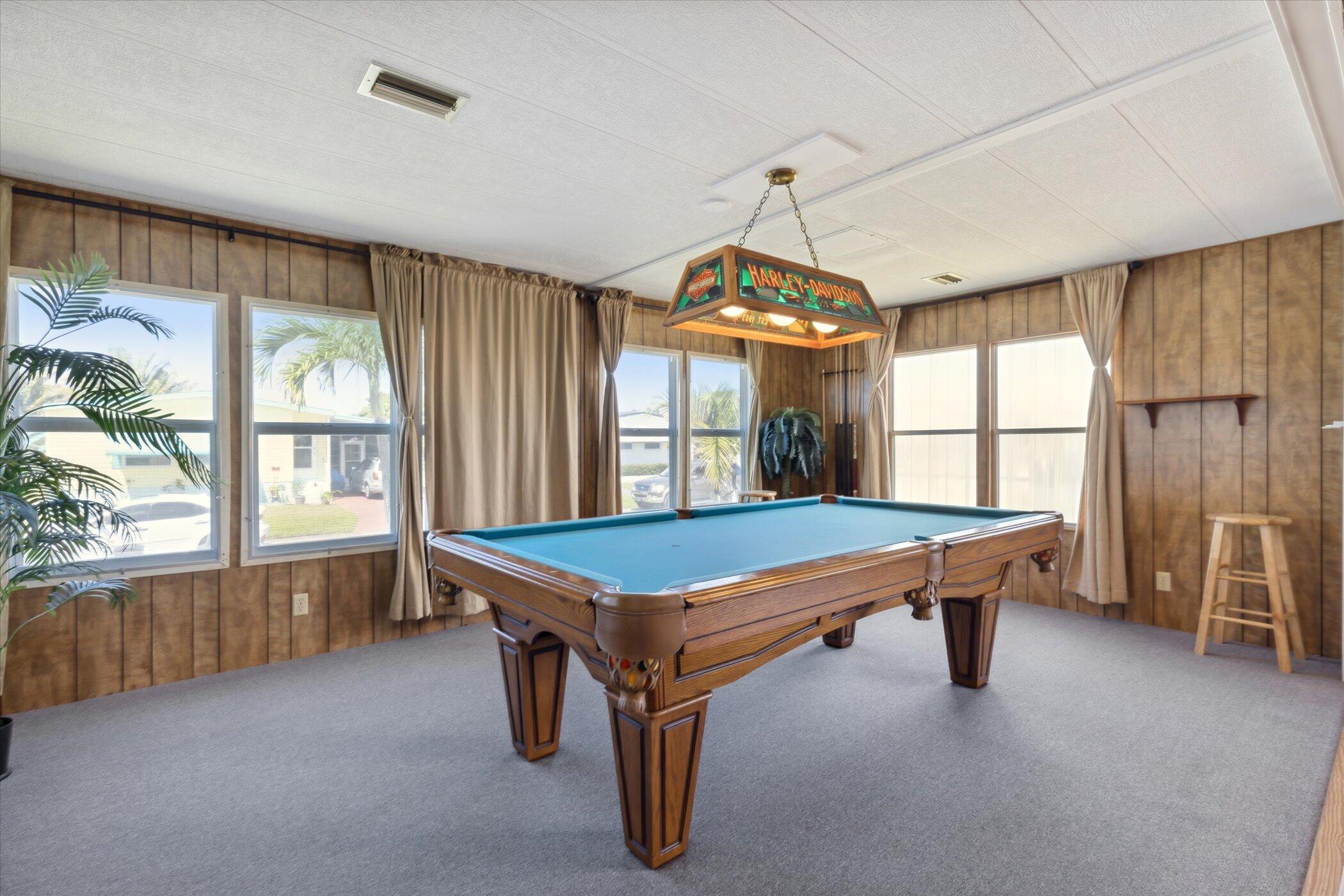 554 Ruth Circle Melbourne, FL 32904 - Photo 12 of 36 a room with pool table and windows