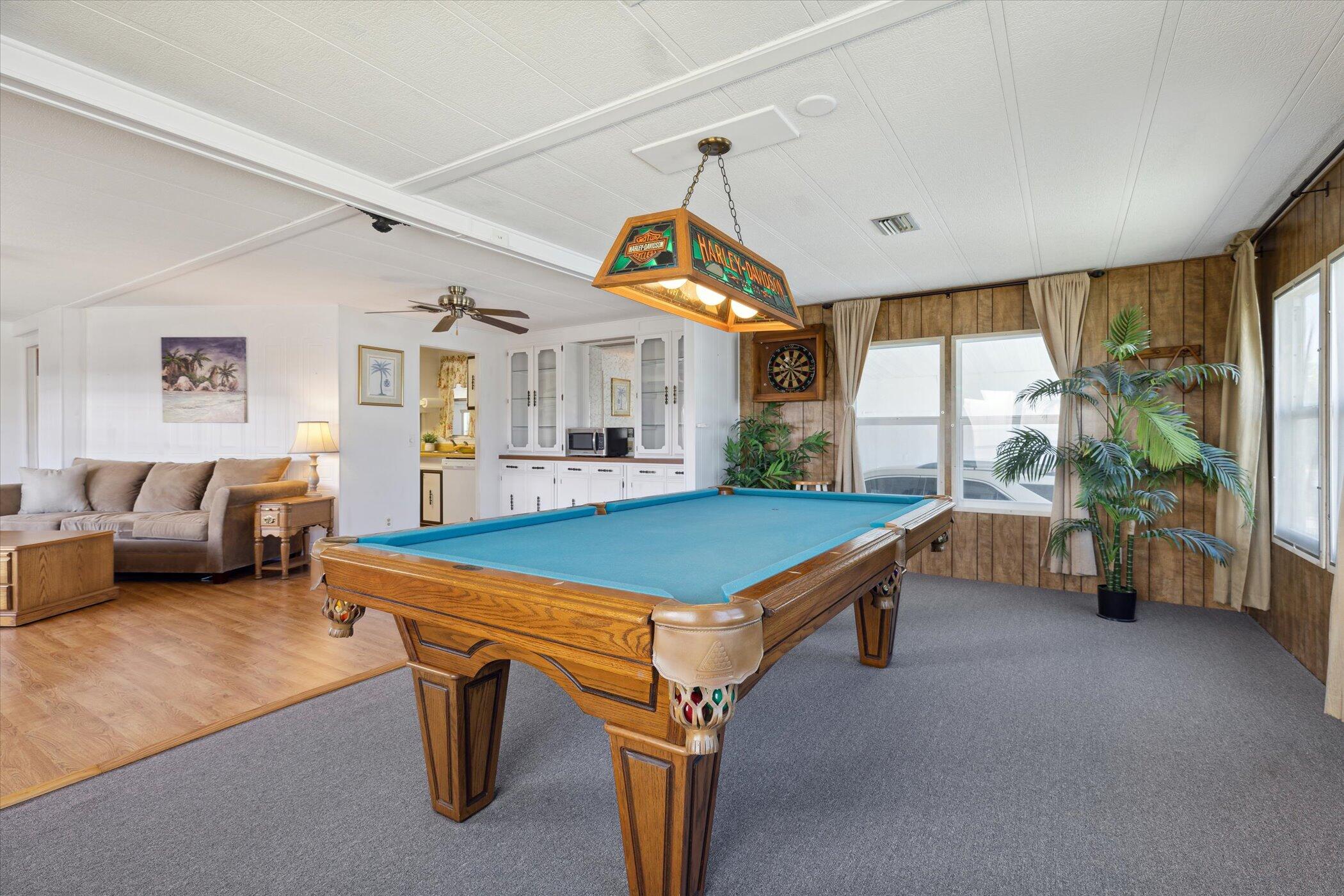 554 Ruth Circle Melbourne, FL 32904 - Photo 13 of 36 a room with pool table and windows