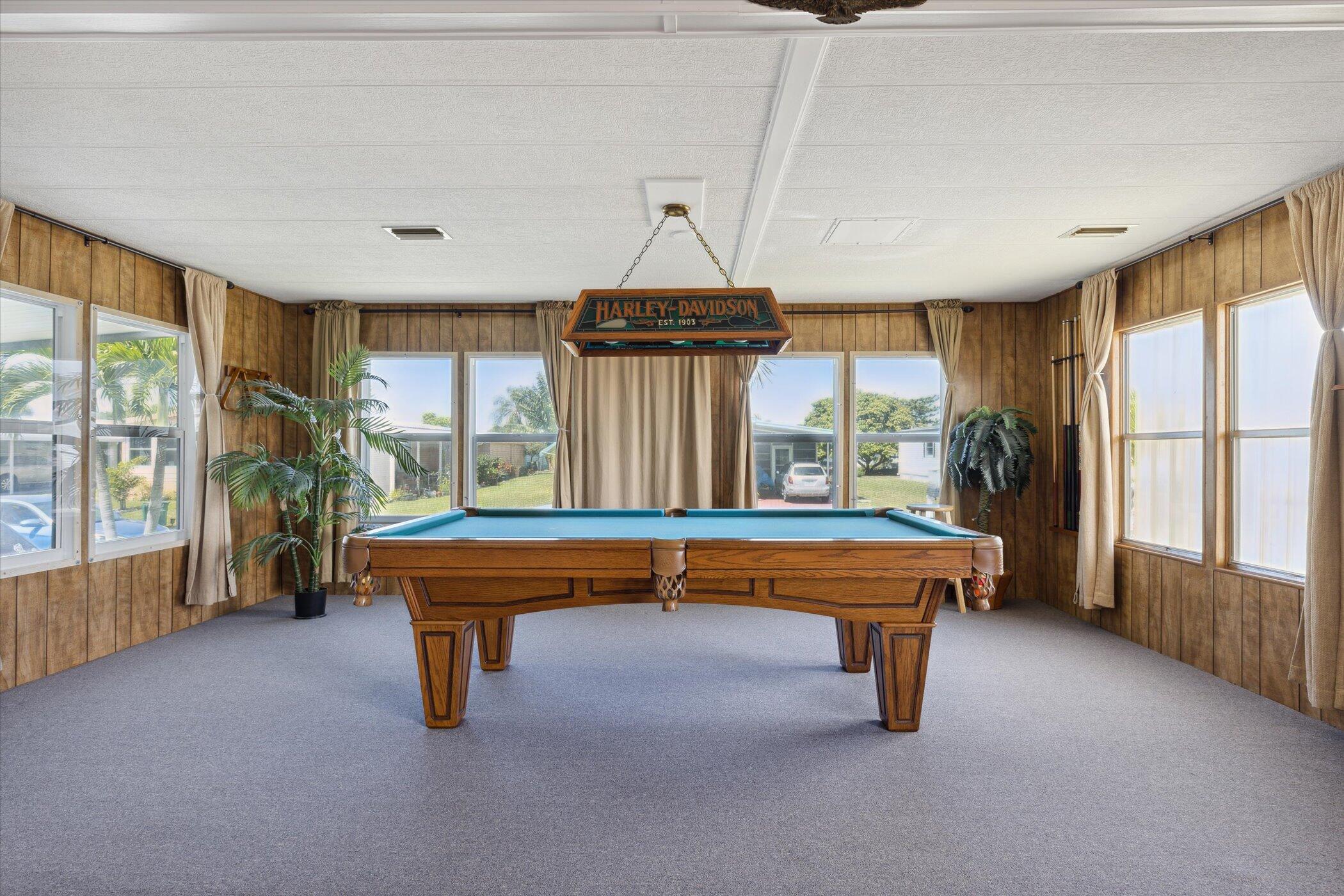 554 Ruth Circle Melbourne, FL 32904 - Photo 14 of 36 a room with pool table and windows