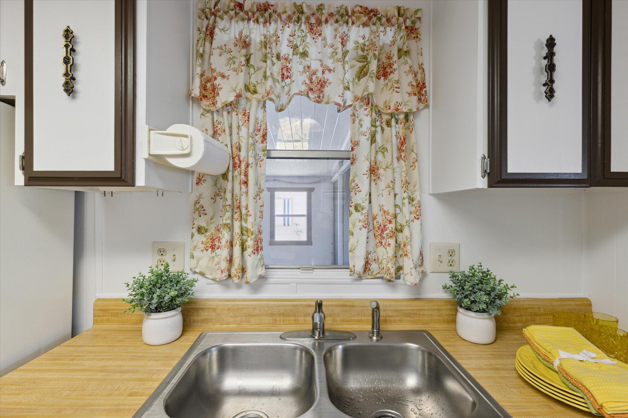554 Ruth Circle Melbourne, FL 32904 - Photo 17 of 36 a bathroom with a granite countertop sink and a mirror