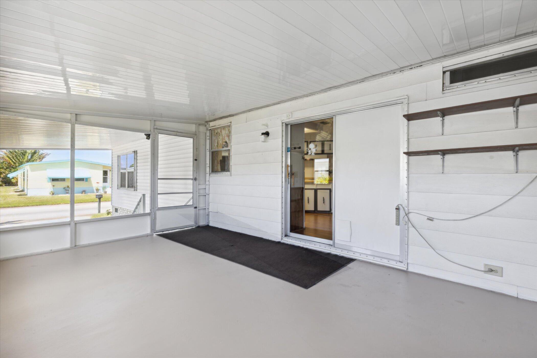 554 Ruth Circle Melbourne, FL 32904 - Photo 29 of 36 a view of an empty room with a window