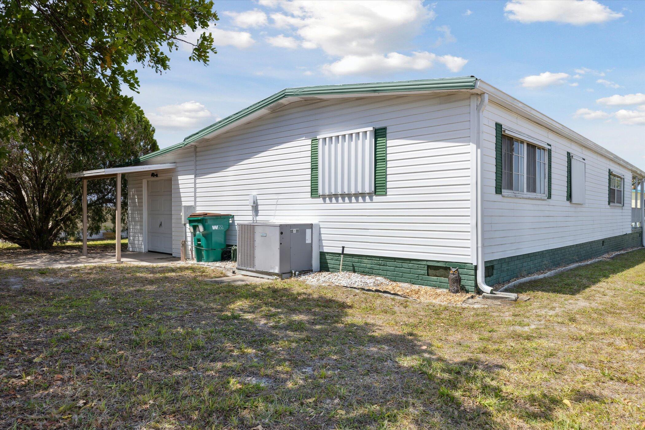 554 Ruth Circle Melbourne, FL 32904 - Photo 35 of 36 a view of a house with a yard