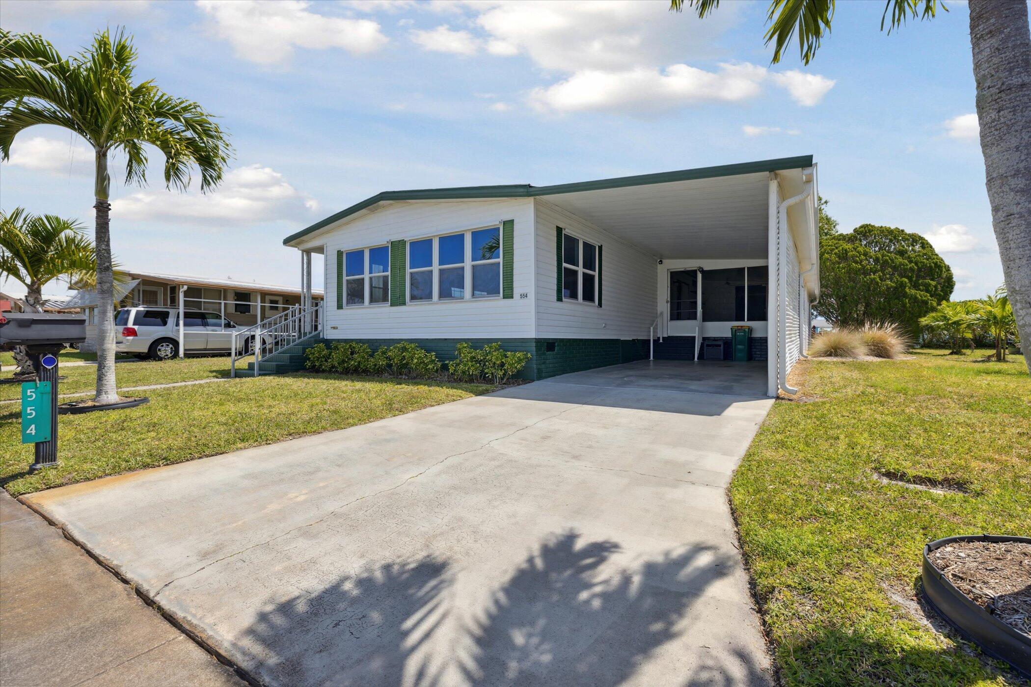 554 Ruth Circle Melbourne, FL 32904 - Photo 4 of 36 a view of a house with a yard