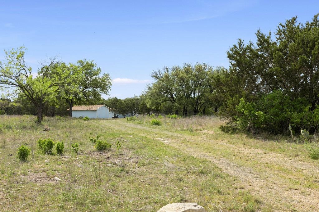 107 Estates Drive Kempner, TX 76539 - Photo 6 of 23 a view of a yard with an trees