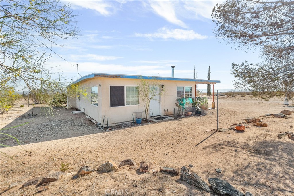 a view of a house with a snow
