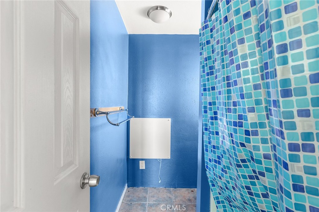 475 Fair Acres Landers, CA 92285 - Photo 12 of 19 a bathroom with a shower and a sink