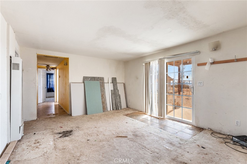 475 Fair Acres Landers, CA 92285 - Photo 5 of 19 a view of a room with a large window