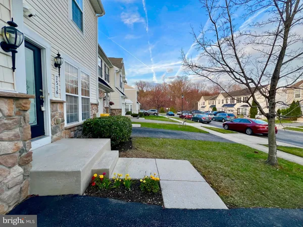 a front view of a building with garden