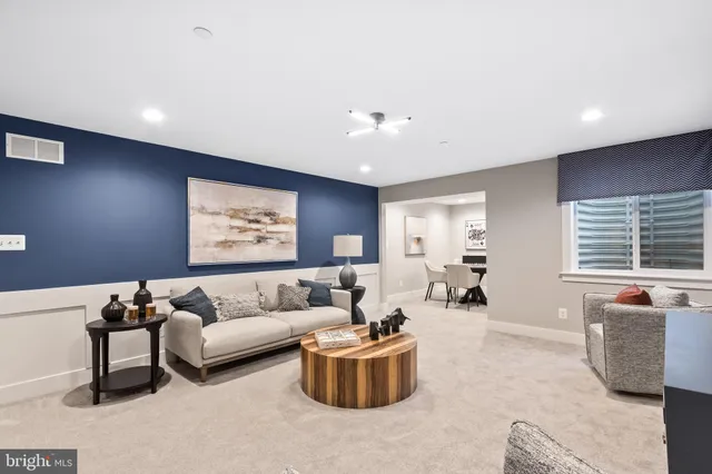 a living room with furniture and a couch