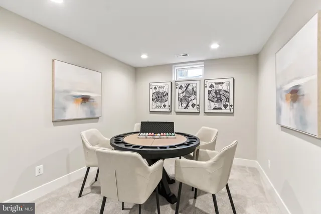 a view of a dining room with lots of tables and chairs