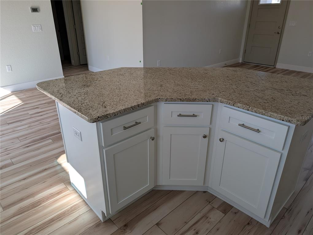 37 Fir Drive Trace Ocala, FL 34472 - Photo 12 of 31 a view of cabinets and wooden floor