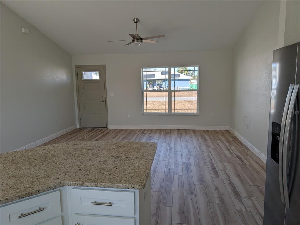 37 Fir Drive Trace Ocala, FL 34472 - Photo 13 of 31 an empty room with wooden floor and window