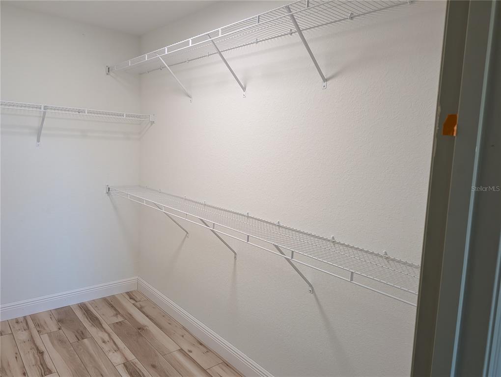 37 Fir Drive Trace Ocala, FL 34472 - Photo 29 of 31 a view of a room with racks on the wall