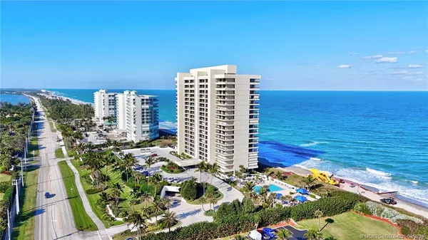 a very nice looking living room with a large window