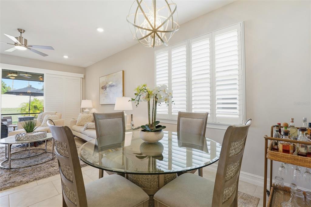 112 Ibiza Loop Venice, FL 34292 - Photo 11 of 35 a view of a dining room with furniture window and outside view