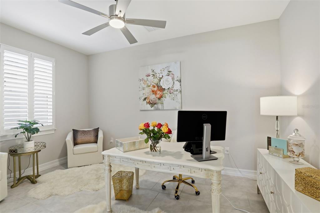 112 Ibiza Loop Venice, FL 34292 - Photo 13 of 35 a living room with furniture and a potted plant