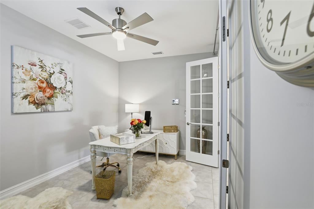 112 Ibiza Loop Venice, FL 34292 - Photo 14 of 35 a living room with table and a painting