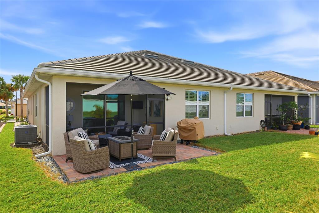 112 Ibiza Loop Venice, FL 34292 - Photo 26 of 35 a view of a house with a patio