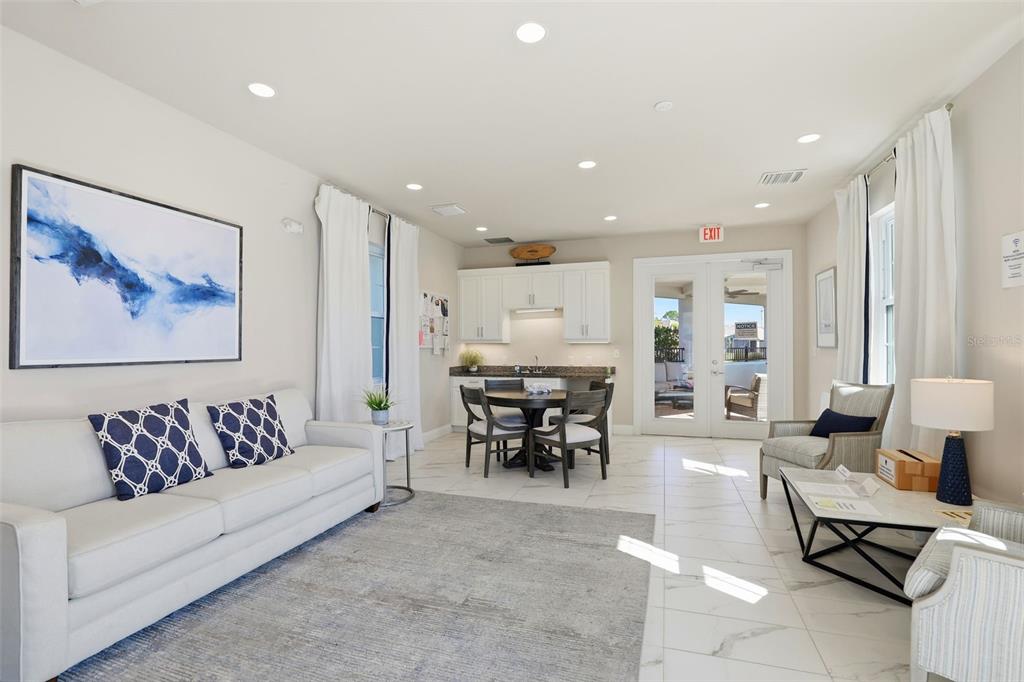 112 Ibiza Loop Venice, FL 34292 - Photo 30 of 35 a living room with furniture and a large window