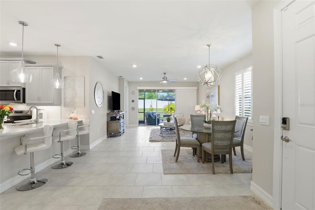 112 Ibiza Loop Venice, FL 34292 - Photo 10 of 35 a view of a dining area with furniture