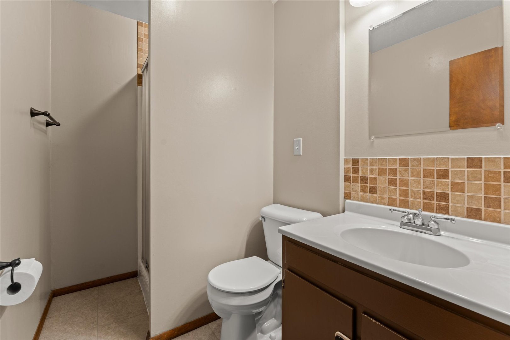 1108 Riverside Court Mahomet, IL 61853 - Photo 25 of 50 a bathroom with a sink toilet and mirror