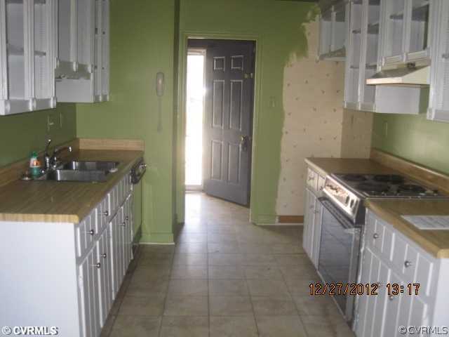 4630 Brookridge Road Chesterfield, VA 23832 - Photo 3 of 10 a kitchen with a sink and cabinets