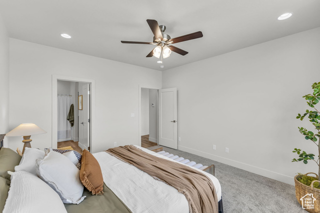 155 East 360th Street East, Unit 10B Fillmore, UT 84631 - Photo 19 of 43 Carpeted bedroom with ensuite bathroom and ceiling fan