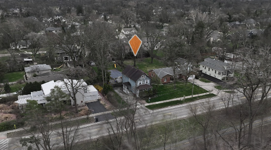 933 Harms Road Glenview, IL 60025 - Photo 18 of 25 a backyard of a house with a yard and outdoor seating