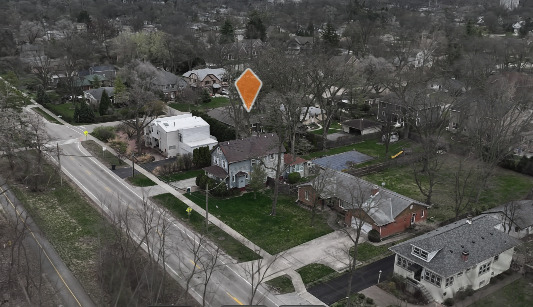 933 Harms Road Glenview, IL 60025 - Photo 23 of 25 a backyard of a house with table and chairs