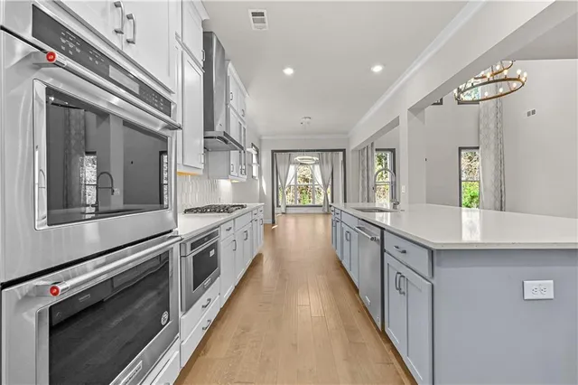 a view of an entryway with wooden floor