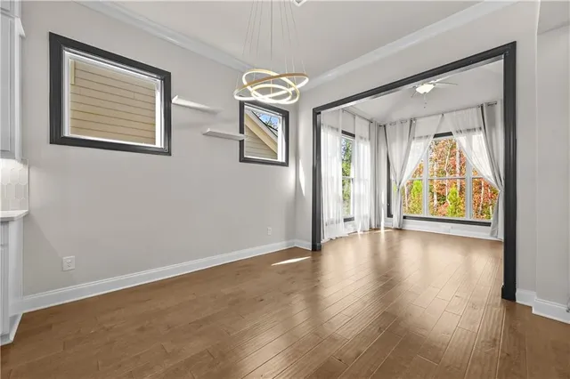 a view of entryway with wooden floor