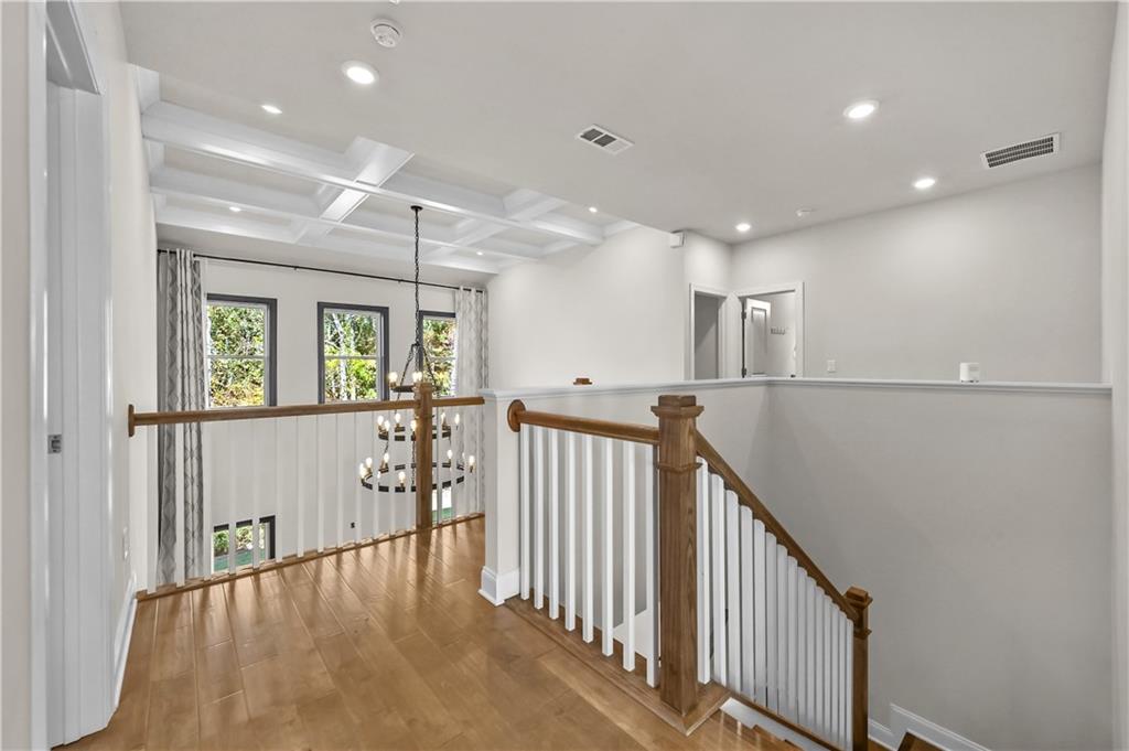 3475 Benedict Place Suwanee, GA 30024 - Photo 23 of 42 a view of an entryway with wooden floor