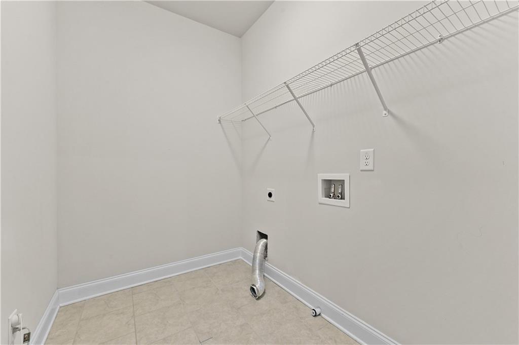 3475 Benedict Place Suwanee, GA 30024 - Photo 30 of 42 a bathroom with a shower