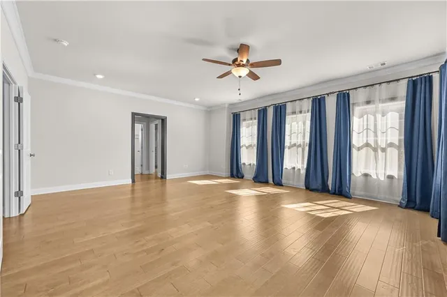 a bathroom with a granite countertop tub sink and mirror