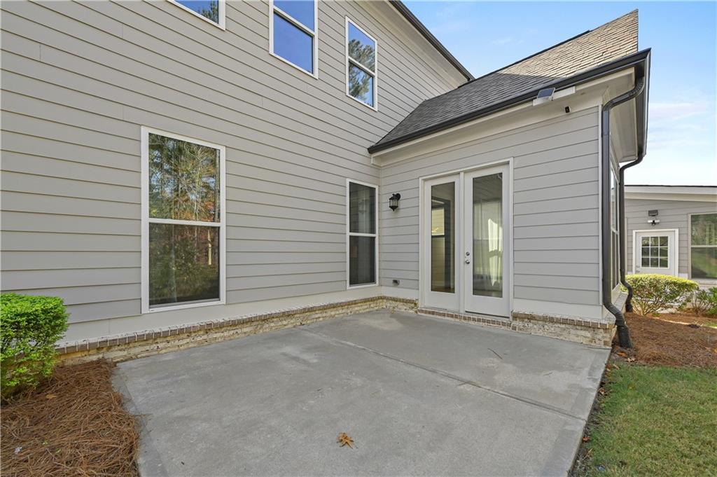 3475 Benedict Place Suwanee, GA 30024 - Photo 37 of 42 a view of a house with a yard