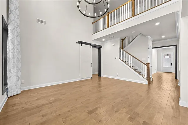 a view of a hallway with staircase