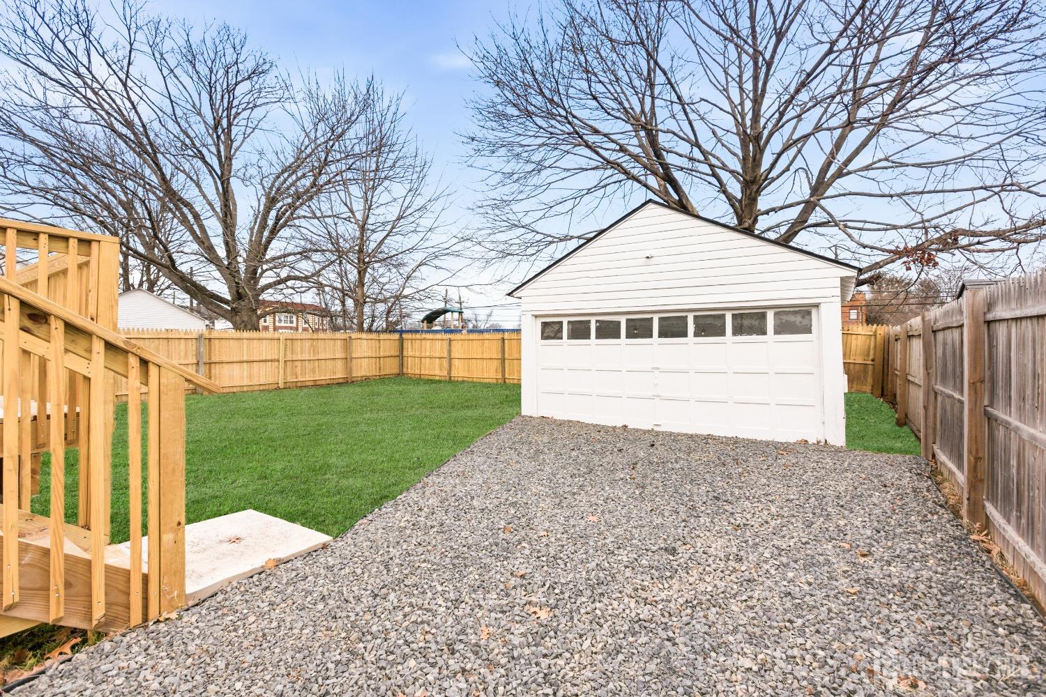 23 Morse Avenue Edison, NJ 08817 - Photo 24 of 31 a white house that has tree in front of it