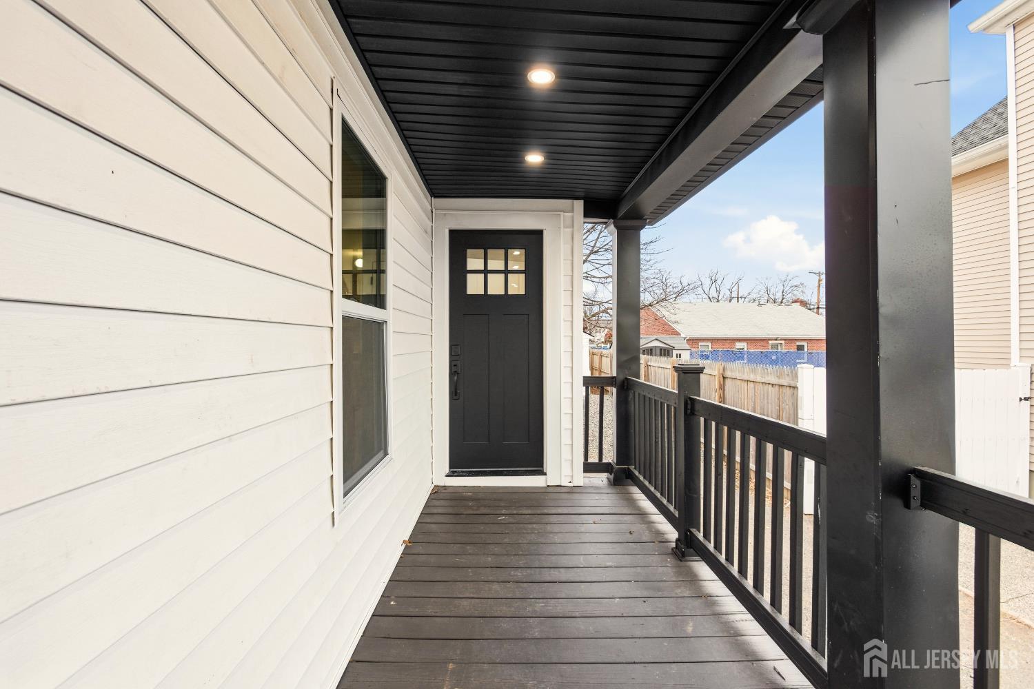 23 Morse Avenue Edison, NJ 08817 - Photo 6 of 31 a view of a porch with wooden floor and outdoor space